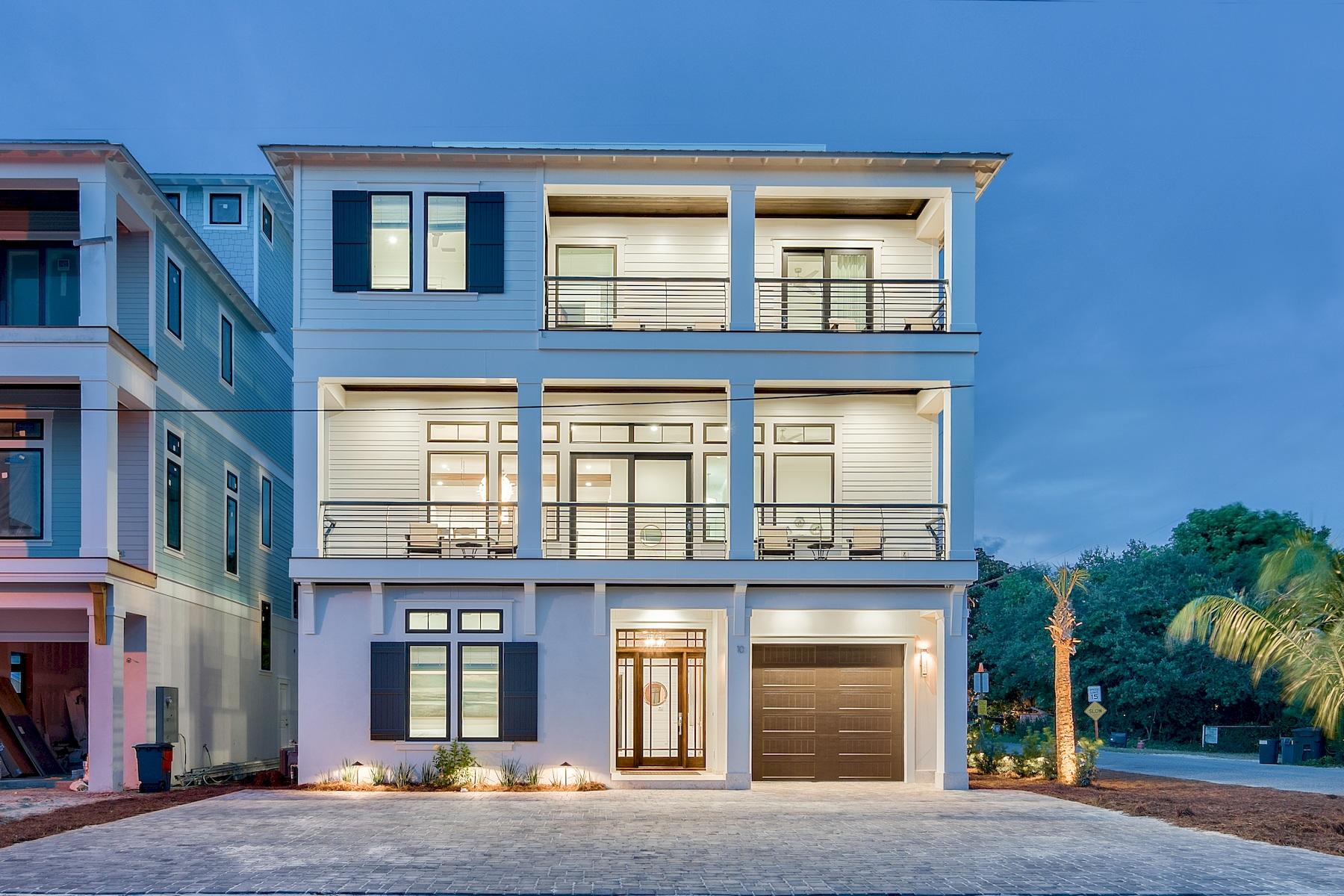 Sleek coastal contemporary design perfectly situated to capture gulf views & masterfully configured providing unparalleled amenities including a Watermark-built private resort style pool area complete with a covered outdoor summer kitchen. This is the ultimate beach house, an excellent income producer with $250,000 in gross projected annual rental income. This home was designed to maximize functionality and finely appointed with chic contemporary finishes while affording optimal comfort & living space. Notable features include multiple indoor and outdoor living areas, private commercial grade elevator, dual master suites with gulf views, built-in pinterest worthy bunkbeds, indoor and outdoor surround sound system as well as security cameras