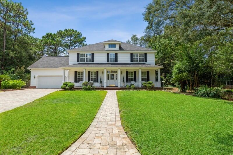 Under contract with a Kick Out Clause. This is the dream home you have been waiting for, on more than a half acre in the desired neighborhood of Rocky Bayou Estates, this home has it all. The fully fenced backyard has a gunite pool with gorgeous pavers and a fire pit. Adorable building with water, electricity and it's own HWH, great for storage or could be converted to a pool house. Inside you will find a theater room, formal dining room, formal living room open to the kitchen, a massive Florida room, laundry/mud room and a half bath. The master bedroom has a bonus room attached, perfect for a workout room or office. Three other bedrooms and bathroom are upstairs. The kitchen has a beautiful island, gas stove, stainless appliances and lots of cabinet space.