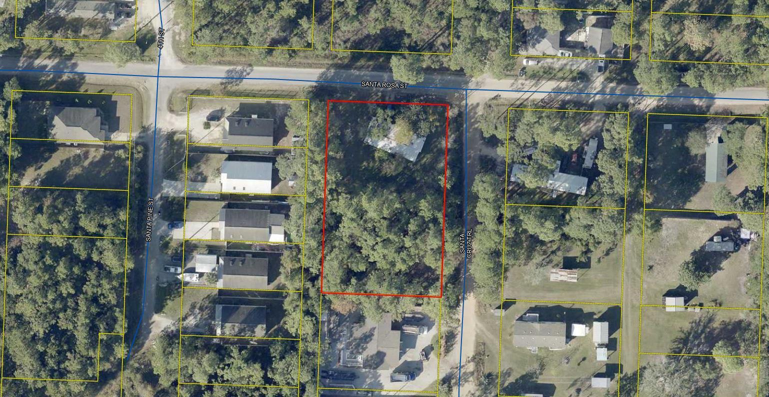 Nestled in the historic heart of Santa Rosa Beach, this property offers a unique opportunity for those seeking a tranquil yet well-connected location. Zoned Residential Preservation, it's perfectly situated near the neighborhoods of Point Washington and the 15-mile coastline that spans from Miramar Beach to Seagrove Beach. The listing photo highlights the entire four lot parcels and was taken from the County PA's website. This listing is Lot 2 and not the entire four parcels. Buyers are encouraged to conduct their due diligence and confirm details with the County PA and County Planning offices. Lots 1, 3, and 4 are for sale.