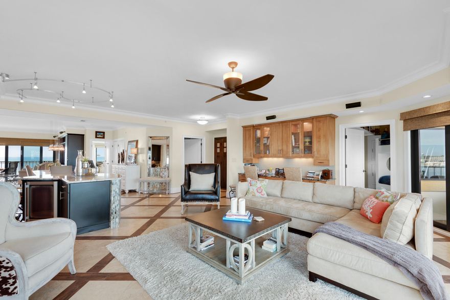 Luxury waterfront living at its finest with this beautiful condo with breathtaking views overlooking the Gulf, Destin Harbor, and the East Pass. When you enter this unit through the custom front doors you experience the pristine beauty of the panoramic views coupled with the tasteful interior design and finest upgrades such as the travertine floors with wood tile trim. The open kitchen features glass tile and the built in GE monogram refrigerator and gas range, wine fridge, GE Advantium Microwave/convection oven, ice machine and Miele dishwasher. The exquisite marble countertops are highlighted with modern lighting. Step into the living room to warm up by the fireplace while viewing the sunrise over the harbor. Travertine and tumbled marble extend into the master suite as do the views of the emerald green waters.  The condo has another laundry room has an LG washer/dryer set with matching base drawers and upper cabinets.
When you are ready to get on the water, it's an easy walk to the marina where you can access your 1 deeded boat slips and sport docks. Many additional features come with the condo such as 1 deeded garages, a covered parking space behind your parking is access to the garages as well as as electric garage door on the exterior. Only 5 or 6 garages in bldg with  single door access as well as exterior electric door and 1 large storage unit. 
Waterview Towers Yacht Club is a gated community with a Marina, pool, hot tub, fitness center, owner room . One of the very few properties that has unobstructed views of both the pass and the harbor. Alll dimensions and measurements to be verified by Buyer.
