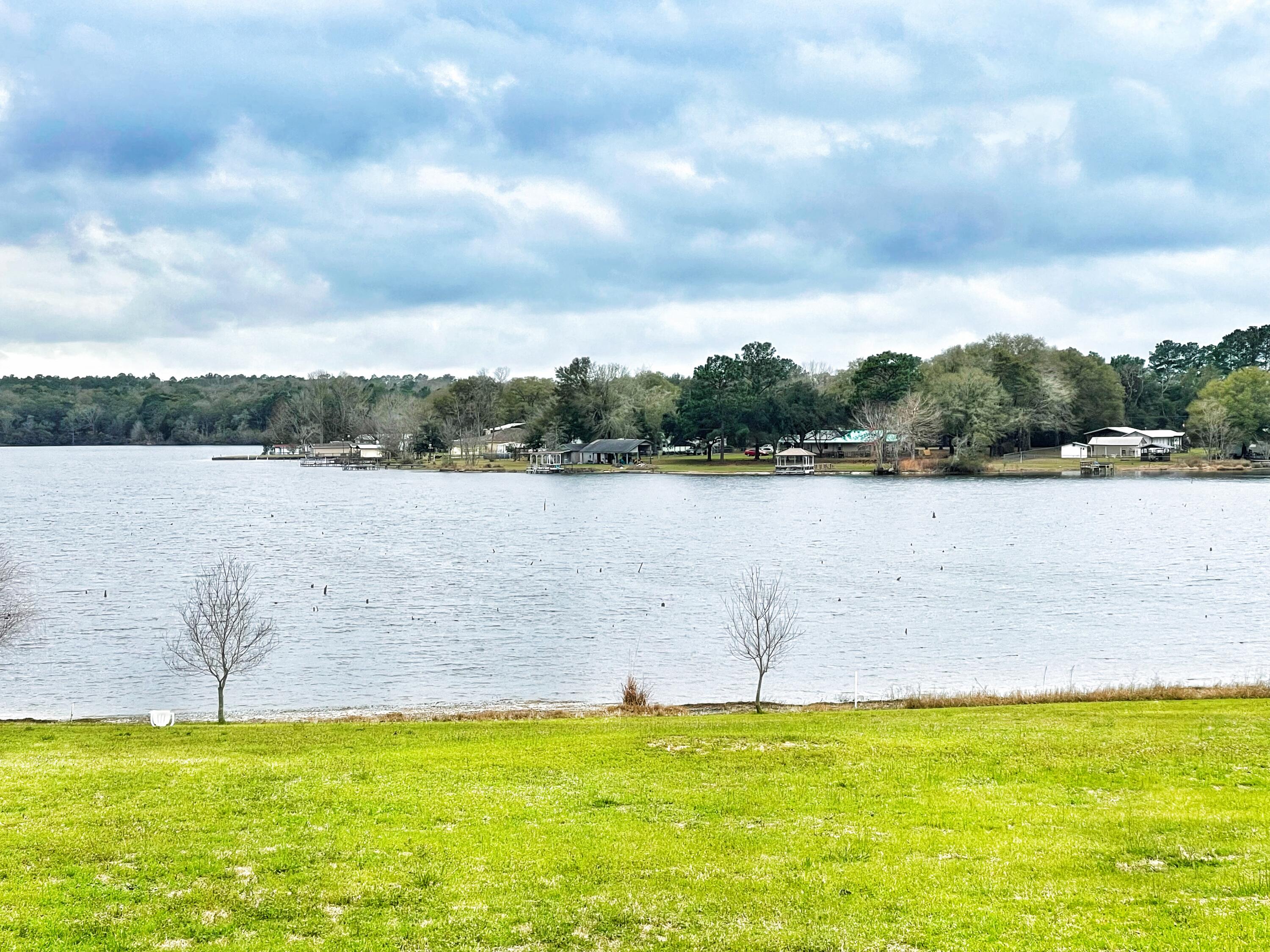 Gorgeous waterfront lot on Kings Lake ready for your new home! Kings Lake is over 500 hundred acres with record size bass, bream, crappie and more. City water is available for this lot. This lot is cleared and ready for you! All measurements must be verified by buyer.