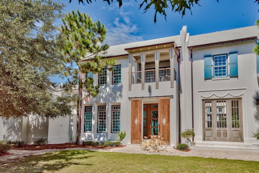 Welcome to 32 Spice Berry....This sleek and sophisticated coastal masterpiece was custom designed by Fou-quet' Architecture and Design along with the homeowners close collaboration sparing no details. Graced in the pristine community of Alys beach this 3 bedroom 3.5 bath with bunks is truly one of a kind. As you walk down Arboleda Park to the front entrance you are greeted with two large custom sliding wood doors that open into a small vestibule accented with custom cement tile. When entering the home your eye is immediately drawn to the open floor plan that flows from the dining room into the living and kitchen. This home is illuminated with an abundance of natural light showing off every detail layered into this home. The custom designed kitchen has stunning, unique marbled quartz and - leathered absolute black natural stone on a multi-level island with modern wood grained cabinetry trimmed in a sharp thick black accent. The upper cabinets are a full overlay above the sub-zero refrigerator and the wolf range. As you travel through the kitchen you will notice the doors leading out to the quaint private courtyard best enjoyed while grilling or enjoying a evening beverage by the open fire pit and water feature. One of the many unique features shown throughout this thoughtfully designed home is the custom dog room under the glass railed stairs, even fido has a spot. Heading up to the second level you'll enter into an additional living/media room with adjacent custom bunks. There are two junior master suites off the media room with ensuite private baths as well. As you leave the living/media room and head toward the master you'll walk down an opulent hall with clear glass floor transoms that accentuate all natural light. The truly unique details in this special home lie in the elegant master suite that is accented with walnut floors and a vaulted walnut ceiling. As you enter the spacious and exceptional master bathroom you will find separate double vanities a stand-alone tub and a separate carrera all marble shower. Another unique feature is the make-up vanity and small foyer as you walk directly in to the enormous custom designed master closet fit for a queen/king. (Think Sara Jessica Parker in "Sex in the City" BIG) The master suite also host a private balcony overlooking the park.