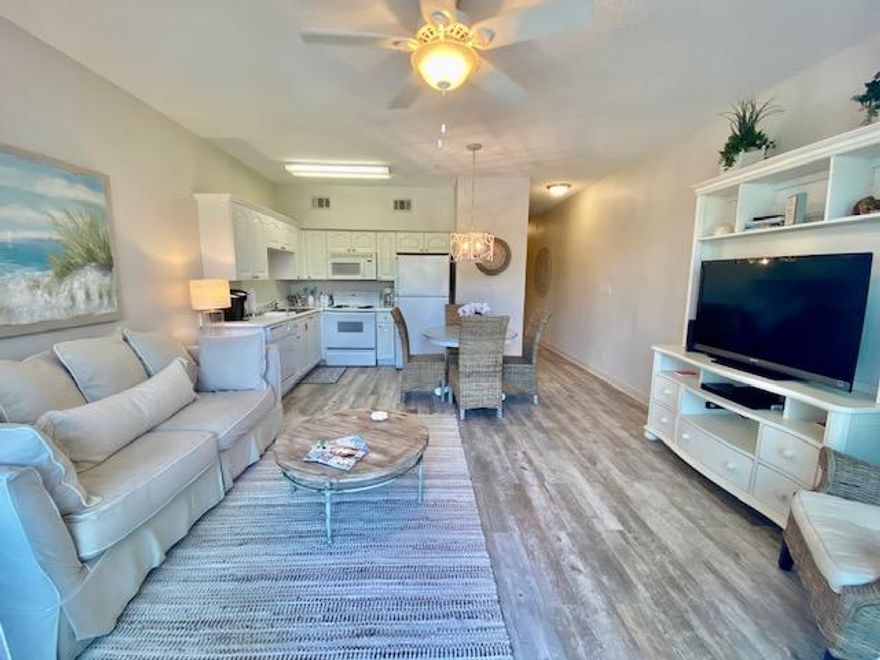 This beautifully decorated condo is in a prime location to walk out your back door and enjoy the pool or beach. This immaculate 1 bedroom condo with built in bunks has new flooring, new paint, new bedding and new furniture. New sliding glass doors have been installed. (14K). This condo is located in the Gulf Place community which has 3 community pools, 3 private deeded beach accesses, tennis courts, local restaurants, boutique shopping and artist galleries. It also has a 2 acre amphitheater lawn that host concerts, festivals, arts shows and more.