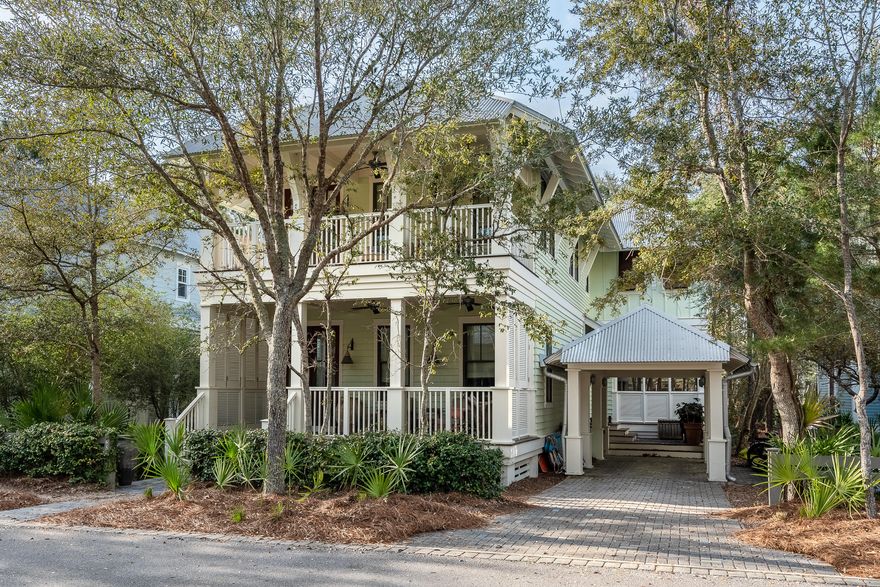 This Stunning, turn-key WaterColor home is prominently located in one of the most desirable locations of Phase II, situated graciously on the green of Camp WaterColor backed by a serene pond and Wood Fern Park. As you enter the home you are greeted with beautiful hardwood floors, high ceilings, shiplap walls and custom interior finishes throughout making a true craftsman. The open-concept floor plan is an ideal entertainment space with a chef's kitchen with top of the line stainless appliances, offering a large center island with a prep sink, butler's pantry, wine refrigerator and ample dining space. There is one spacious bedroom on the main level and a beautiful master suite with double vanities and a private balcony. Additional guest rooms are located on the second level, one with built