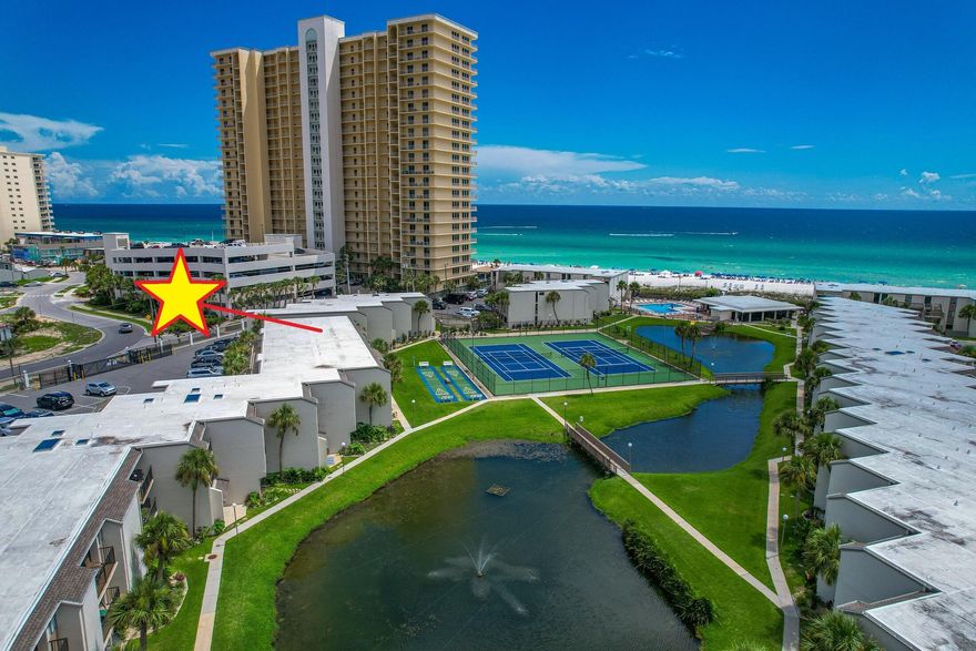 INVESTOR'S DREAM!!! Newly Remodeled (over $35k), one of the only Pet Friendly Vacation Rentals on the Beach, park just a Few Feet from your door (no elevators!), Sleeps 8, INCREDIBLE ROI potential, and located in one of the most Highly sought after locations on the beach... The PERFECT condo truly does exist!Booked all Summer for an immediate return on your investment!!!Maximizing rental income starts with one basic concept - maximizing ''Heads in Beds.'' And when it comes to ensuring incredible occupancy rates, this unit offers all the key amenities renters look for when booking their vacation: View, Location, Complex Amenities, and Price. VIEW: Most people come to PCB for the breathtaking Gulf views, and this condo does not disappoint. What they don't expect is to also have an incredible view over an expansive courtyard that is so well manicured, including a beautiful Koi/Turtle pond.  Sugar Beach is the only place on the beach with views like this, and they are truly unforgettable... 

LOCATION: After watching some of the world's most awe-inspiring sunsets, simply head out your front door and experience the legendary action of Thomas Drive. If you don't want to drive to dinner, rest assured knowing that your vehicle is safely parked right outside - and there is no need to drive anywhere to enjoy the best that PCB has to offer. 

Located on the coveted East end of the beach (considerably less traffic), there are go cart tracks, video arcades, mini golf courses, thrill rides, ice cream shops, a winery, souvenir shops, etc. - directly in front of the property. 

For the adults, there are numerous bars/restaurants, and countless options for live music, right outside your door - including the Famous Ms. Newby's! No need to drive after those adult beverages, your condo is perfectly located just a few seconds away!!! 

And did I mention that Tootsies is soon opening it's very first beach bar just 2 doors down?!? Yep... talk about KILLER location!!!

AMMENITIES: Success in business is all about Competitive Advantage, and Sugar Beach offers something that differentiates itself from every other rental in PCB... It is one of the only PET FRIENDLY Gulf-front destinations in the entire area. 

Years of market data shows that pet friendly options bring a higher nightly rate, have a better occupancy rate, and are more likely to attract ''snowbirds'' during the off season, so you have true competitive advantage with this one.

In addition to being pet friendly, Sugar Beach is a private/family friendly gated community with no elevators. The list of Gulf Front complexes where you can park directly at your door are few and far between, but Sugar Beach offers exactly that! It also offers a private gated beach access, a pool, huge clubhouse with games, tennis/pickleball courts, shuffleboard, a grilling area, over 375 feet of incredible beach access, and expansive greenspace unique from every other Gulf Front property in PCB! 

PRICE: Last but not CERTAILY not least, renters pick their vacation condo based on price. With a low selling price, low utility costs, and some of the lowest HOA's of all the competition, you have less overhead which ensures that you can charge less per night (as compared to the competition), bringing in strong rentals and generating an incredible profit!

The average 2 bedroom in Sugar Beach brings in over $40k annually in rentals, and some of the well-established ones bring in over $70k. At the high end your annual ROI potential is truly  limitless!!!