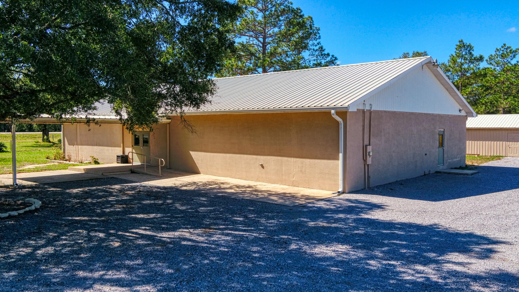 Back on Market at NO Fault to seller. OPPORTUNITY!!! 6+/- ACRES WITH 4892 SQ. FOOT BUILDING, READY FOR OCCUPANCY. Located in RAEO (Rural Area Economic Opportunity) Enterprise Zone. Recently Renovated! Handicap accessible, restrooms, full kitchen, storage room and additional storage building. Possibilities are many for the use of this building. This property was recently rezoned as COMMERCIAL. Walton County says nothing would be required to continue use as a civic minded venture and Commercial opportunities are limitless with this large parcel. Information obtained from Walton County Planning. Call for your tour today. Buyer should verify all pertinent information to their satisfaction.