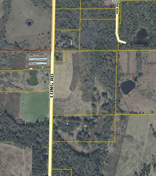 Bring your horses and four wheelers! 39 acres of beautiful land that would make a gorgeous homesite! Horses and other livestock are allowed. Property has been bushhogged and has some very nice trees on it as well as a small creek toward the back. All paved road frontage and paved roads all the way to it. Buy and enjoy the acreage for gardening, camping, and recreation now and build later. Good price! Aerial photos coming.