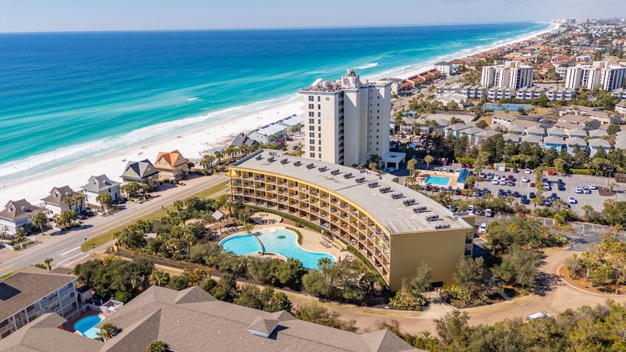 Luxury Beach Condo in Miramar - Your Dream Coastal Escape!Welcome to your slice of paradise at the stunning shores of Miramar Beach! This breathtaking 'Beach Resort' condo offers striking Gulf views, luxurious finishes, and resort-style amenities, making it the perfect coastal retreat or income-generating investment. Step inside & down the hallway to find an open-concept living space bathed in natural light, with large sliding glass doors that showcase the stunning resort pool and emerald green waters of the Gulf. The large kitchen features solid surface countertops, stainless steel appliances, and solid wood cabinetry, perfect for hosting and entertaining. The extra long countertop bar makes for the perfect spot for breakfast and lunch in from the beach! You can also enjoy your - morning coffee and a good book on the large private balcony. The spacious master suite boasts a king bed, a large dresser for storage and a great master closet. The sleeping areas plus two bathrooms allow for 4+ to stay for a visit - one bath with a walk in shower and the master bath with a tub and shower combination. The bunk space is included with a small office desk area and custom sliding barn door for added privacy. 
Enjoy resort-style amenities, including a sparkling pool, hot tub, splash pad with fountain, private beach access, and private parking, all just steps from your front door. Whether you're looking for a full-time residence, vacation getaway, or lucrative rental property, this Miramar Beach condo is a rare opportunity you don't want to miss.

Experience the best of Gulf Coast livingschedule your private tour today!