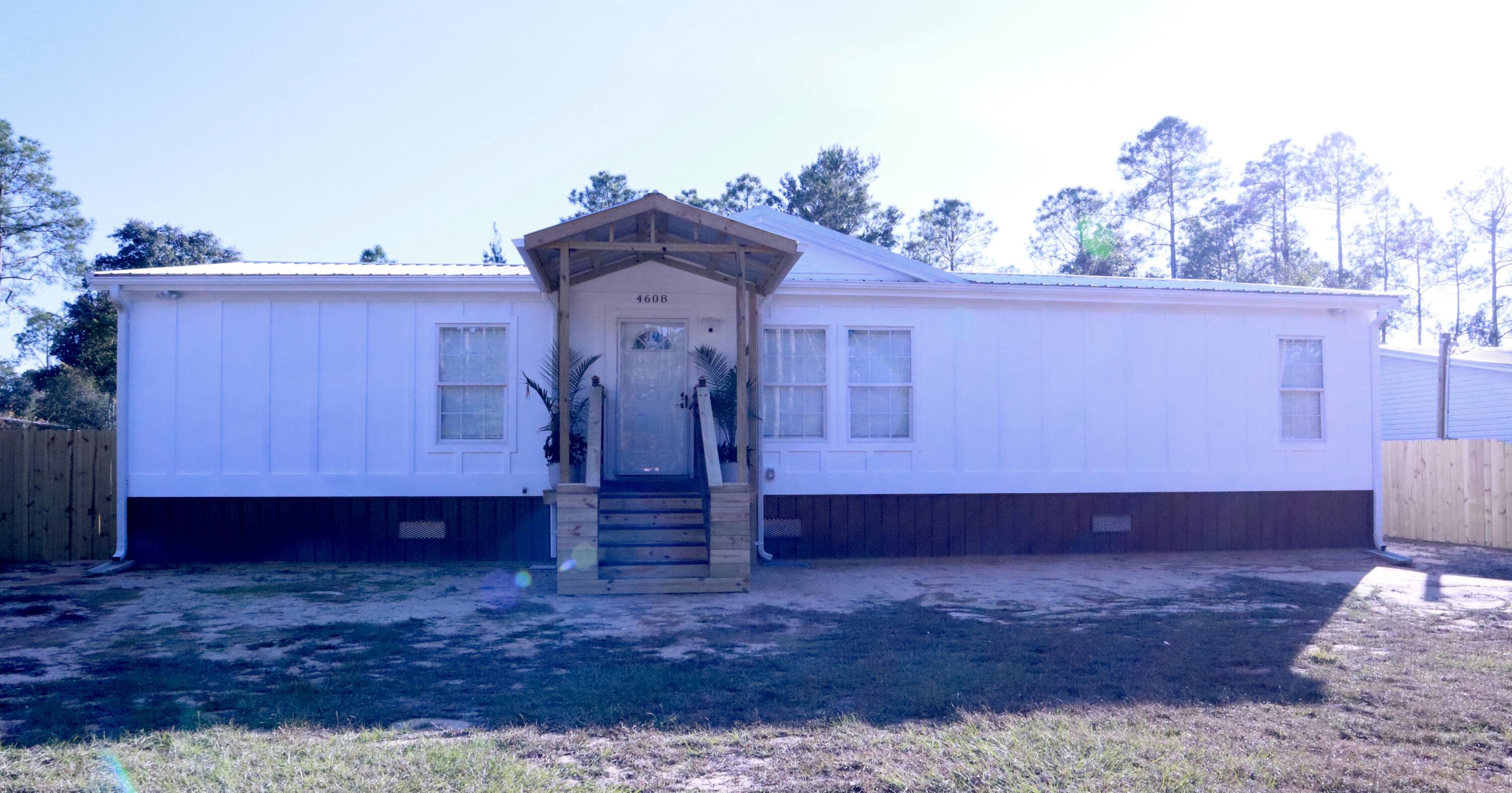 Completely Rebuilt, Like-New Manufactured - Move-In Ready!Discover a beautifully reimagined 4-bedroom, 2-bath residence in Crestview, FL, offering exceptional quality and thoughtful design. This isn't your average manufactured home--this property has been entirely rebuilt from the ground up with high-quality plywood construction, ensuring strength and durability that make it feel like a traditional family home. From new insulation and drywall to a brand-new electrical system, plumbing, HVAC, metal roof, and septic system, every detail has been thoughtfully crafted.Step into the spacious master suite, complete with a walk-in closet, double vanity sinks, a luxurious soaking tub, and a separate shower. Two additional bedrooms also feature walk-in closets, providing ample storage and flexibility for a growing family or guests. The kitchen is a true highlight, with elegant granite countertops, a central island, and all-new stainless steel appliancesperfect for family meals or entertaining.

Outside, enjoy the privacy of a fully fenced backyard a secure and welcoming space for kids, pets, and gatherings. with proximity to Eglin Air Force Base and local amenities, this home is ideal for those seeking a long-term residence with convenience, style, and peace of mind.

Don't miss the chance to make this meticulously upgraded home your own! Schedule a viewing today to experience the comfort and quality of this like-new Crestview gem.
