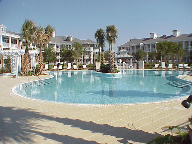 TOP FLOOR WITH A BUNKROOM/DEN in Sandestin's Village Of Baytowne Wharf. The perfect first condo! Sleeps 6. Fully furnished and rental ready. The bathroom offers a bathtub and a separate shower. Balcony looks out over the lush amenities deck with it's heated, ''zero-entry'' lagoon pool, hot tub, cold tub, fireplace pavilion & fitness room. Owners have access to the Founder's Club. Just steps from all of dining and fun of the Village and a bike or tram ride to the Beach, Golf Tennis, marina, etc!