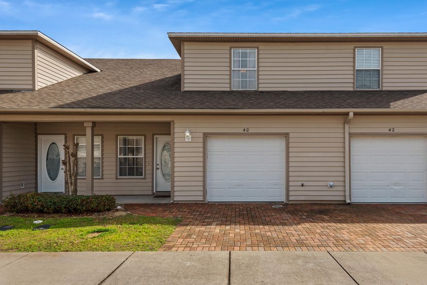 Welcome home to 40 Avery Drive! This well maintained townhome is located just minutes away from Eglin AFB, NWFL State College, and Turkey Creek Park! Inside you'll find wood look pergo flooring leading down the hallway, past a half bath, and into the large family room. There is room for an office in this space or an oversized dining set in the dining area. A breakfast bar looks into the well appointed kitchen that features stainless steel appliances, granite counter tops, and lots of cabinet space! The first level also includes access thru a sliding door to the back yard green space and access to the 1 car garage with laundry room space included in the garage. Upstairs you'll find a beautiful master suite with 2 closets and large bathroom.