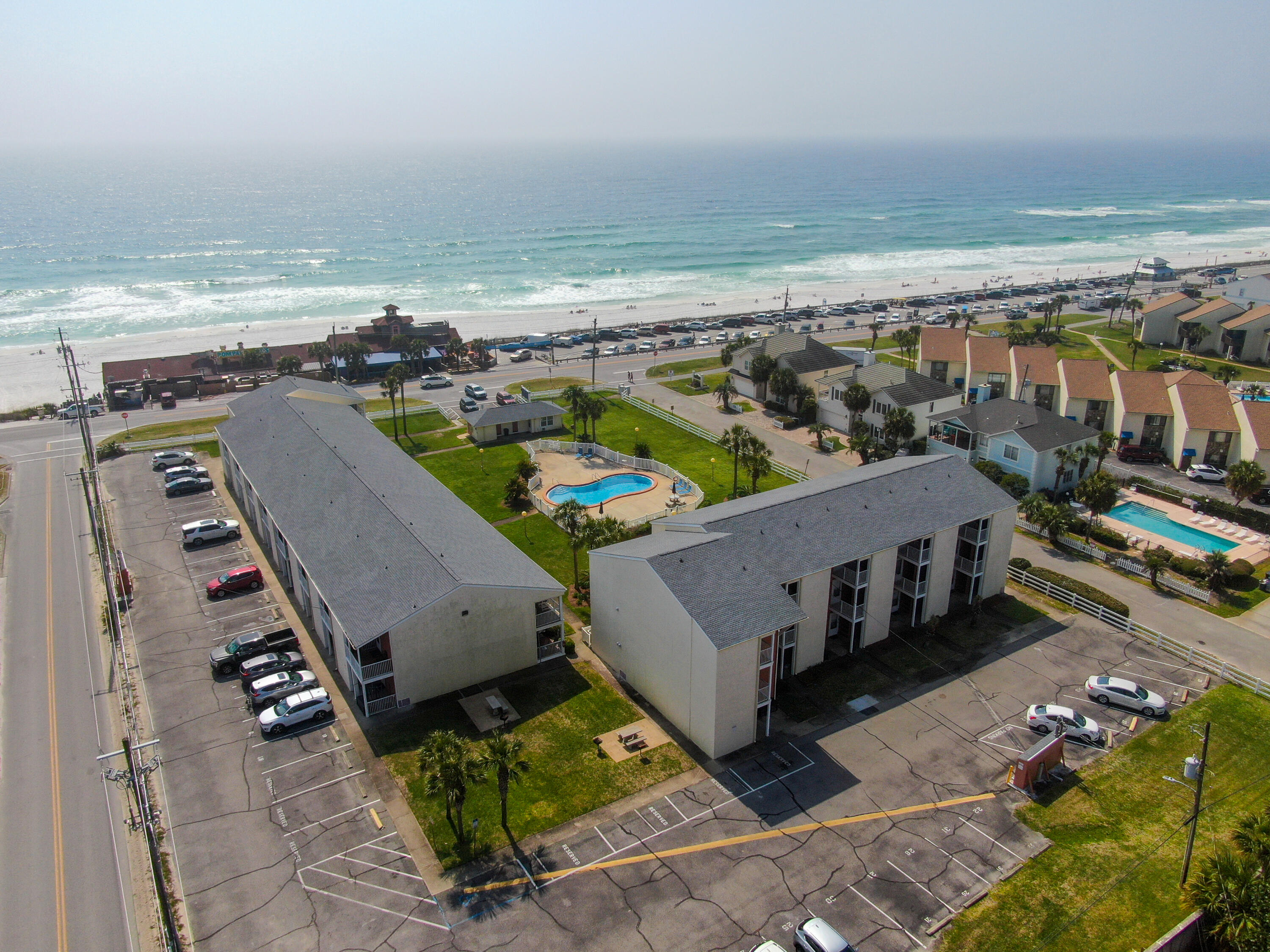 RARE Find Ground Floor 2/2 Condo just steps away from the Beach, Pool and Pompano Joe's. .