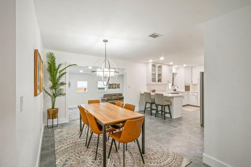 Discover this beautifully renovated ranch-style home perfectly positioned in the Ferry Park / Yacht Club neighborhood of Fort Walton Beach. Enjoy effortless access to Fort Walton's most beloved park, Ferry Park, and the nearby Fort Walton Yacht Club -- ideal for those who love recreation, convenience, and community living.Situated on a spacious corner lot of a cul-de-sac, this turnkey home blends timeless charm with modern updates. Inside, you'll find authentic hardwood floors, a stylishly updated kitchen, and thoughtfully renovated bathrooms. Two expansive living areas provide flexible space for relaxing or entertaining, while a dedicated workshop offers room for hobbies or extra storage.Additional recent upgrades new windows and 2022 roof. Don't miss this exceptional home!