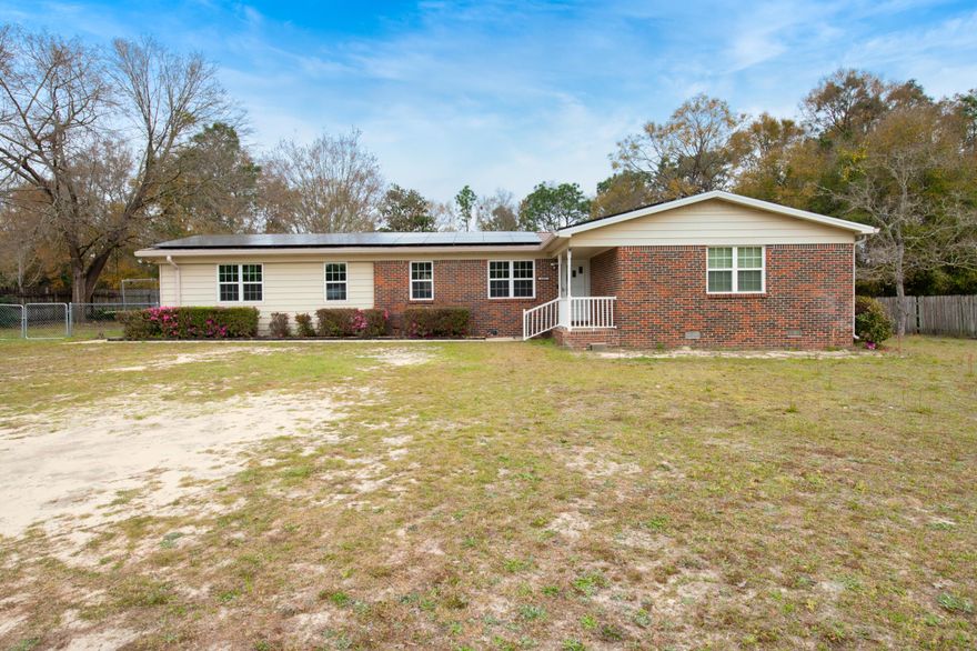 Who wants a $35 electric bill?! Brand new solar panels!   This lovely brick home has peaceful water views of neighboring Middle Creek and sits on nearly an acre. A fourth bedroom has been added to this already spacious home that features and living room and family room.  You will feel as if you're out in the country, but still close to city amenities. The roof is approx. 3 yrs., newer HVAC and brand new solar panels with warranty.  Sellers state their electric bill is only $35 a month. *Speak with your agent for more info on the solar panels.*Shed conveys as-is.