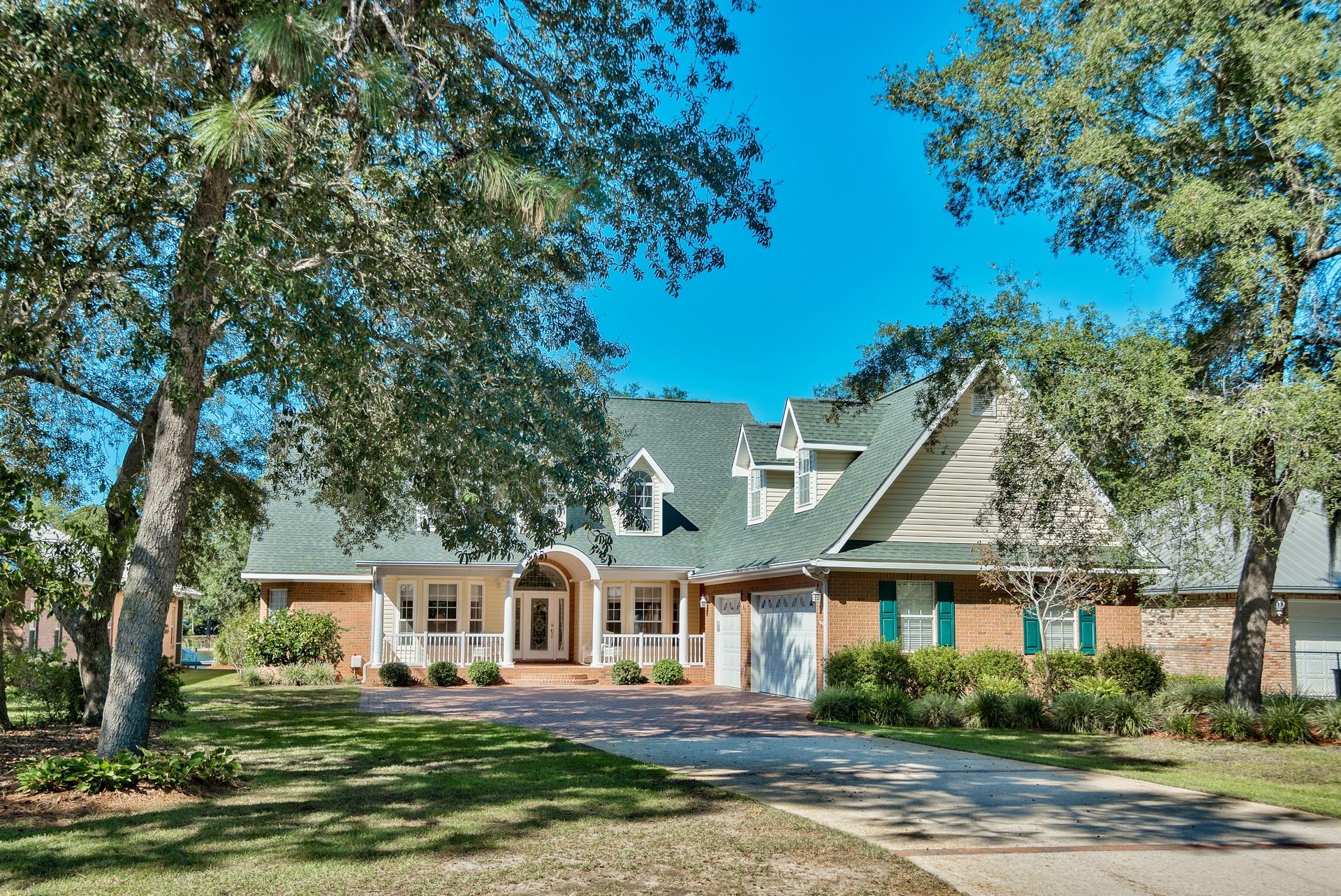 JUST REDUCED by $50,000!! Water Front Living! Expansive Water Front home located on a protected bayou with water & power connected, private boat dock & boat lift. Enjoy the Florida Lifestyle in this one of a kind custom home situated on a well landscaped lot with indigenous plants & mature live oaks. With upgrades galore, this meticulously maintained home features 6 bdrms, 4 baths, a separate office, formal dining room, formal living room with gas fireplace, oversized water front family room/sunroom with classic V-groove wood ceiling and travertine floors and more. The over-sized eat in kitchen opens up to the family room with views of the water and features oversized center island, gas cooking, built in double ovens, built in microwave, butlers pantry, breakfast nook, breakfast bar, plenty of cabinets for storage, more makes this the best make this the perfect place to enjoy family time while cooking your favorite meal. Still owned by the original owners, this Classic Southern Living Vernacular Style home is set up to enjoy outdoor water front living and entertaining with a plethora of custom features. Hardwood floors, custom crown molding thru out, 2 bedrooms and 3 full bathrooms on the main level with main level waterfront master bedroom and outdoor decks make everyday living easy. The second level offers 4 oversized bedrooms with 2 of the bedrooms
offering water views, a separate seating area, oversized closets thru
out and a separate arts and crafts closet for your seasonal decorations and a 50x30 above garage storage area. Additional features include large front entry porch, lots of windows offer plenty of natural light and views of the water, 3 car garage with PVC tiled floor and tons built in storage cabinets, brick paver parking area, 2 A/C units, 2 water heaters with a continuous hot water pump, gas operated partial home generator, and much more. This custom built home shows pride of ownership thru out and is a must see. Call today for a private appointment to view this one of kind home. Conveniently located, within minutes to the beaches, shopping and entertainment, sacred heart hospital and more.
Buyer to verify all information important to buyer including but not
limited to room sizes, lot size, zoning, features etc