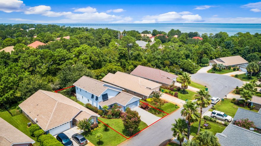 Beautiful 4 bedroom, 3 bath home conveniently located in the gated community of Emerald Lakes! Enjoy quick access to Destin Commons, multiple shops and restuarants, Chowctawhatchee Bay and the spectacular beaches of Destin, FL! This lovely home has a large living room, an updated kitchen and a spacious florida room and open deck off the rear of the home! The master bedroom and primary living are both located on the first floor. Additional bedrooms complete the second floor of this well cared for florida home. You'll appreciate the expansive back yard with mature oaks and privacy buffer at the rear of the home. Perfect for full time living or a second home near the beach! All infomation is believed to be accurate, but it is the Buyer's responsibility to confirm.