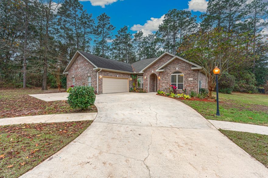 This home is one of a kind! The home was custom built and has all the upgrades you could ask for. As you walk into the living room overhead is a cross beamed ceiling along with a stacked stone fireplace. All 3 bedrooms come with their own private bath. The home boast 8ft solid wooden doors throughout the home. The home also has an office with its own private bath. The kitchen has granite countertops, gas down draft Jenair island cook top.  The master bedroom has a walk in shower, jacuzzi tub and his and her walk in closets. The laundry room is a hurricane safe room .The neighborhood offers lighted sidewalks throughout the subdivision. A community pool and playground are perfect for weekends adventures.