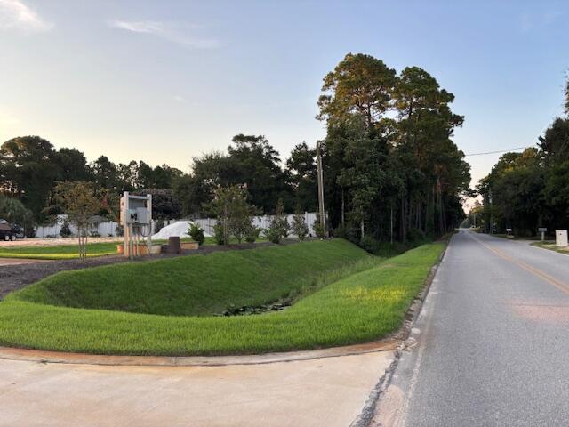 Calling all developers and investors! Great opportunity to complete the development of Palmetto Trace, a 1.17 acre property. The lot has been prepared for 8 luxury townhouses. Land has been cleared, utility connections installed, landscaped, irrigated and waiting on final approval to build. Buyer to confirm zoning, lot dimensions, acreage and feasibility of projects.