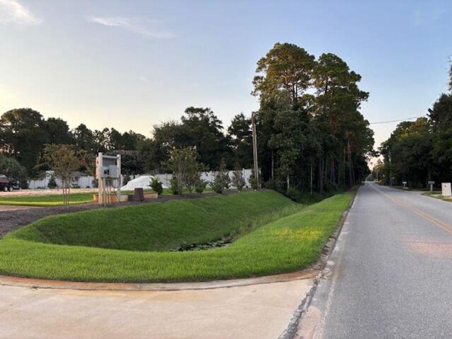 Calling all developers and investors! Great opportunity to complete the development of Palmetto Trace, a 1.17 acre property. The lot has been prepared for 8 luxury townhouses. Land has been cleared, utility connections installed, landscaped, irrigated and waiting on final approval to build.  Buyer to confirm zoning, lot dimensions, acreage and feasibility of projects.