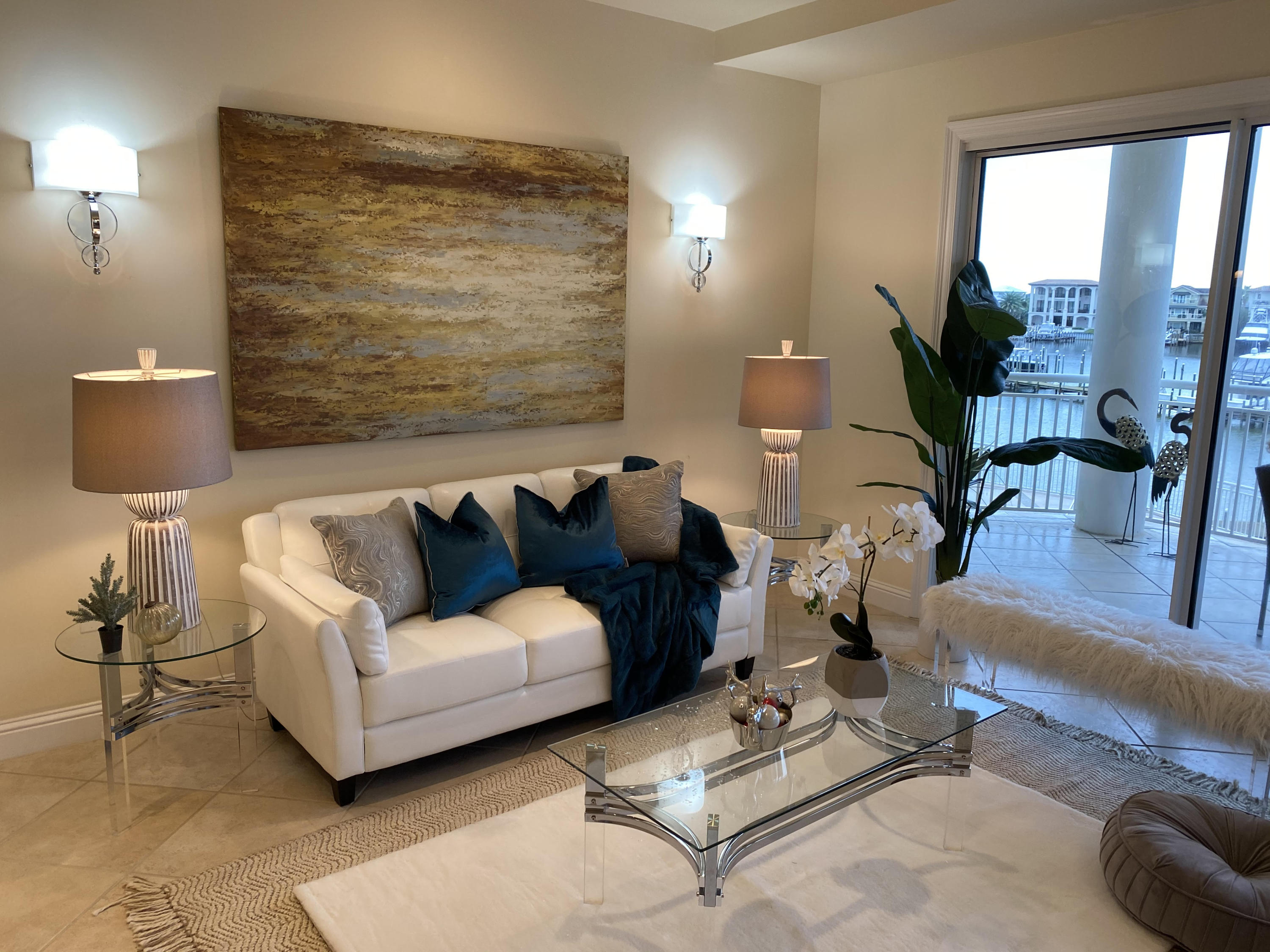 All new staging with designer furnishings! All new painting in progress on the exterior of the building. Beautiful white/soft gray color. Luxury harbor living with sweeping views of the Destin harbor and beautiful sunsets. An expansive balcony which extends the length of the living room and master bedroom and comes equipped with a gas grill. Open concept featuring two living areas with natural light from the floor to ceiling windows. The master bath features dual sinks, a jetted tub, extra large shower with 3 separate heads. A wet bar, two ice makers, surround sound, and designer lighting are a few of the bonus features. Nest thermostats to monitor your heat and air if you left home and forgot it on. Don't let the first floor fool you because it built up 30 feet.