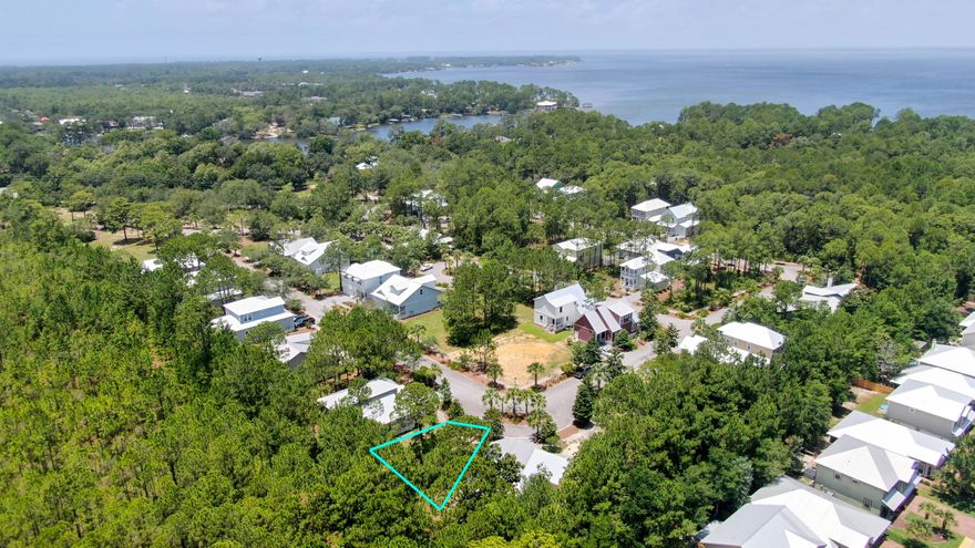Beautiful Lot in the gated community of Hidden Grove! This lot is located on the back right corner for peace and quiet. The Hidden Grove development offers Florida style cottage homes, a community pool, and a pergola, perfect for entertaining and enjoying the outdoors. Great location - close to the beautiful beaches on the emerald coast, awesome restaurants and shopping at Grand Boulevard and 30A. Tap fees paid. Buyer to verify all information deemed necessary.