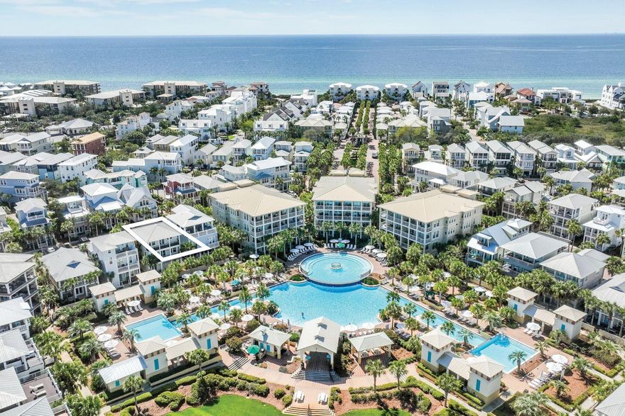 This spacious five-bed, four-bath beach house is superbly located overlooking the 12,000-sq.-ft. lagoon pool in the heart of Seacrest Beach.  With a little updating, this property could be a great investment for rental income or just to enjoy with family and friends. Balconies on the upper floors allow everyone to find their own quiet space. The second-floor has an inviting open kitchen, dining and sitting area for gathering around the TV for movie nights, board games or leisurely dining.