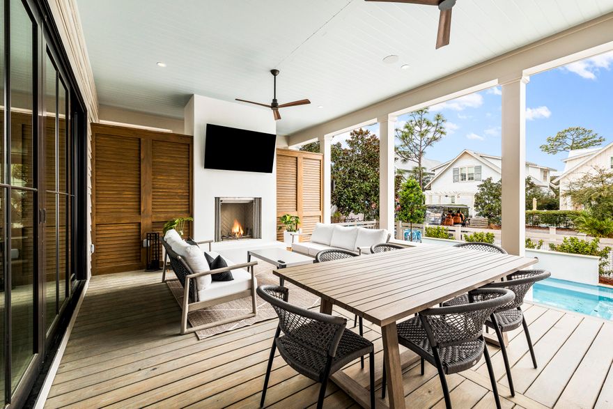Tucked along a peaceful pocket park in WaterColor's highly desirable Lake District, 25 Bluestem Lane is a stunning new construction home that embodies relaxed luxury and effortless coastal living. Thoughtfully designed by award-winning architect Cooter Ramsey and styled by renowned Atelier Davis--an Elle Decor A-List and AD Pro firm--this home is a true work of art, offering sophistication, comfort, and timeless appeal. With 5 bedrooms, 6.5 baths, and a hidden bonus room, this 3,617-square-foot residence was built for gathering and entertaining. The open-concept floor plan is as functional as it is beautiful, featuring 11' ceilings, a 16' wall of glass in the main living area, and a seamless flow between the kitchen, dining, and living spaces. Wide-plank European white oak floors Cambria quartz countertops, designer lighting, and custom tile elevate every inch.

At the heart of the home is a chef's kitchen outfitted with Thermador appliances, open white oak shelving, and built-in buffet and window seating. Slide open the expansive glass doors to let the fresh breeze in and connect effortlessly to the 417-square-foot covered back porchyour year-round outdoor living room. Overlooking the sparkling 10' x 25' heated saltwater pool, this space is complete with a wood-burning fireplace (with gas starter), outdoor shower, custom lighting, and room for both lounging and dining under the stars. The front porch adds an additional 300 square feet of shaded space for morning coffee or afternoon cocktails. A separate 119 sq ft outdoor storage room keeps your beach gear, bikes, or owner lockout items secure and out of sight.

Designed with flexibility in mind, the home features two luxurious primary suitesone on each levelideal for hosting multiple families or long-term guests. Upstairs, two additional guest bedrooms offer ensuite baths, a fun bunk room with a full hall bath, and a secondary living room perfect for movie nights or quiet reading.

Additional features include dual laundry rooms, built-in bars with beverage fridges on both levels, a high-capacity ice maker, Emtek hardware, 8' solid core doors, smart irrigation and pool systems, a tankless water heater, spray foam insulation, Mitsubishi variable-speed HVAC, and more. The home also includes a brand-new 6-seater LSV golf cart and parking for four vehicles, with EV and golf cart charging capabilities already in place.

Fully furnished and move-in ready, this WaterColor retreat offers an elevated lifestyle in one of 30A's most iconic communities. Just minutes from the WaterColor Beach Club, resort pools, tennis courts, nature trails, and Seaside, 25 Bluestem Lane invites you to slow down, settle in, and savor the best of coastal living.