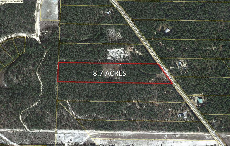8.7 acres . partially fenced. wooded. level. Easy access to Hwy 285, Niceville and the back gate of Eglin AFB. Paved Road frontage. Mossyhead water available. Price right. Mobiles welcome. The adjoining 8.8 acre parcel is also for sale.