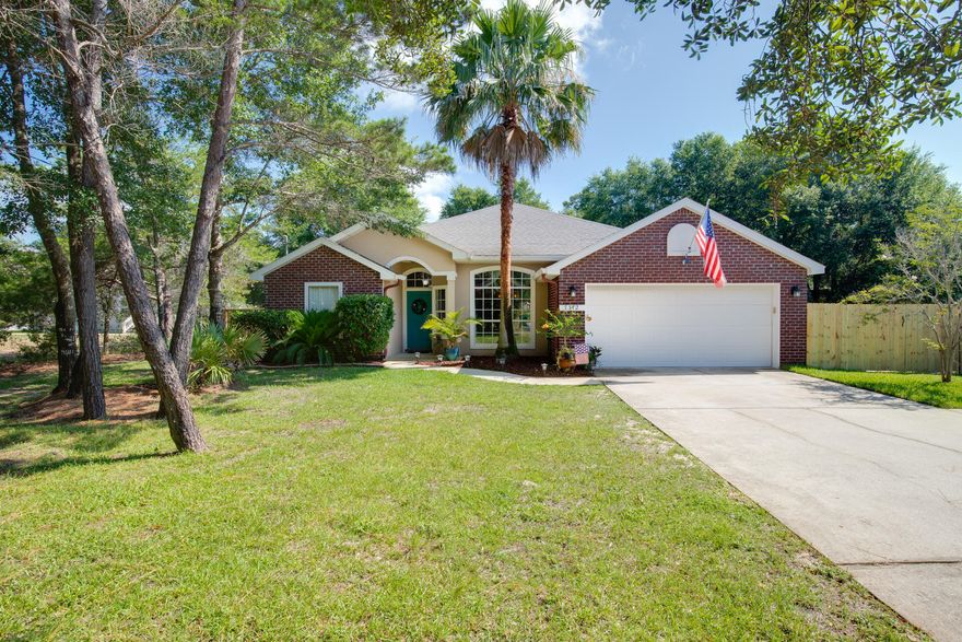 Super Charming home nestled conveniently on East Bay Blvd. This well kept 4 bedroom home invites you inside to a 12 ft vaulted living room ceiling. Quaint kitchen overlooks living Rm for open feel. Includes side by side Fridge, granite counters, pantry, 18'' tile flooring. ADDITIONAL FEATURES: 2018 2 stage quiet AC, French doors w/encased blinds open to back covered screened porch. Hardwood flooring in spacious Master Bedroom w/His/Her walk-in closets w/double shelving, dual vanities w/Granite counters in master bath, garden tub/shower combo. Bay window in Dining Rm. Fans in all BR. NEW sprinkler pump. Knockdown ceilings. Long driveway w/park pad. Garage w/work area ''cubby.'' Cabinets in Laundry Rm. NEW front fencing & gate w/6 ft privacy around backyard. A must see home...Call Soon!