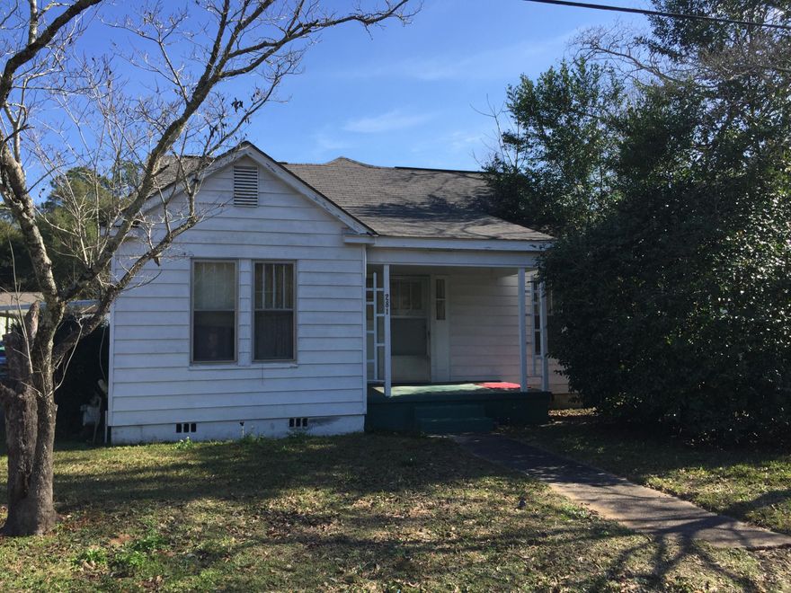 Cottage with wood floors & crown molding. It has been updated with additional large handicap extra bath so it has two full baths. Kitchen has lots of cabinets and washer dryer inside. Formal living room, formal dining room, and family room on back of home.