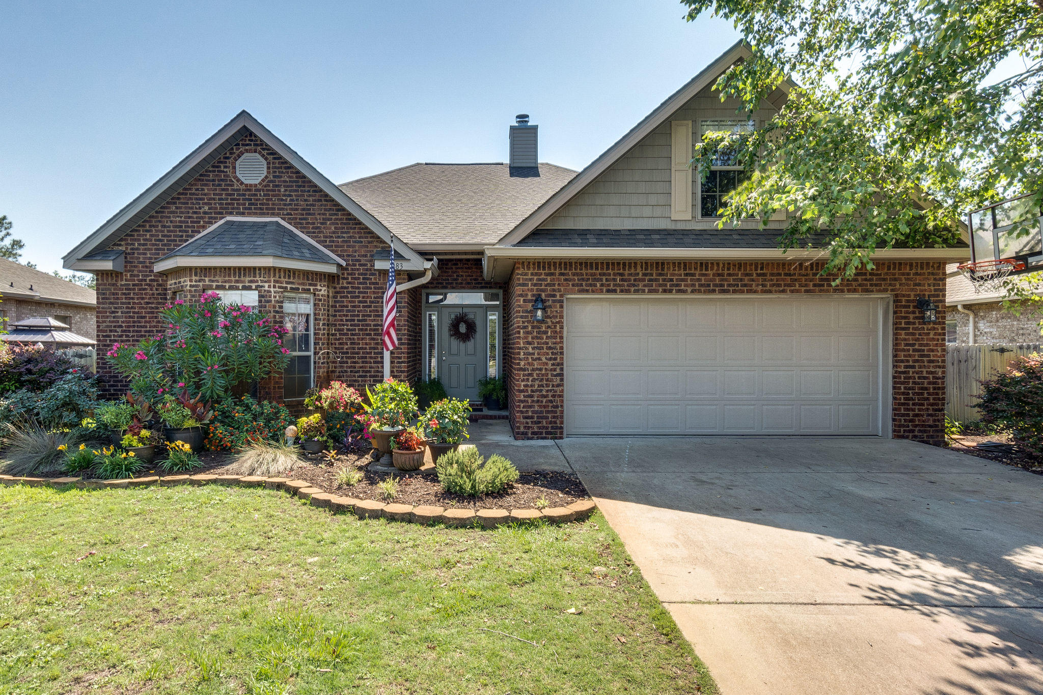 WOW! Enormous & private back yard and deck. You're going to need two grills to cook enough food for all the people you'll be able to entertain. This fantastic home sits on a 1/2 Acre homesite with outdoor space hard to find at any price in our area. The large living room with fireplace and vaulted ceiling is the perfect place for Christmas morning. Too many gifts to fit under the tree? Stack them in the sun room :) The Master Bedroom has enough room for a private living space (for when you don't want the rest of the family to know what you're binge watching on Netflix). The upstairs bedroom is perfect for guests, plenty of privacy. Keep the clutter out of sight with substantial closets in all bedrooms and extra long 2car garage. Surround Sound throughout the home. Call Today.