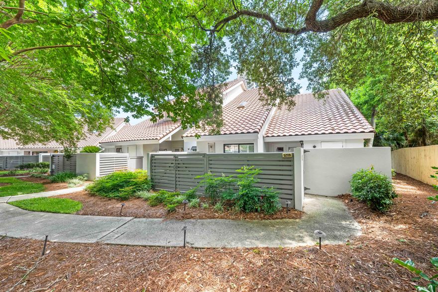 This beautifully renovated townhome is one of the largest units in Beachwalk Villas.  Located on the south side of Hwy 98 on the beachside in Sandestin, it is a short walk or golf cart ride to the beach access and is right on the lake with views from downstairs and the upstairs master. GOLF CART INCLUDED! The master has a walk in closet! The new roof was installed in 2024.  There is custom flooring throughout. It is ideal for a vacation rental with 3 bedrooms, 3 bathrooms and a loft.  The open floor plan makes this a great investment for a place to relax and entertain, and also as a rental.  It has a full size washer and dryer, new HVAC which is serviced regularly, new kitchen appliances, a fireplace, and a lake front deck!The seasonally heated pool for residents of Beachwalk Villas is a fun place to relax with your guests and get to know your neighbors!  Sandestin Golf and Beach Resort has over 2,400 acres from the beach to the bay, with abundant amenities. Enjoy four championship golf courses, fifteen world-class tennis courts, a full-service 226-slip marina, and scenic biking and hiking trails. Indulge in celebrity chef dining and shopping at The Village of Baytowne Wharf, Grand Boulevard, and the Market Shops of Sandestin. The resort also features a full-service spa, ensuring a perfect balance of relaxation and activity.  This is resort style and golf cart life at it's finest!