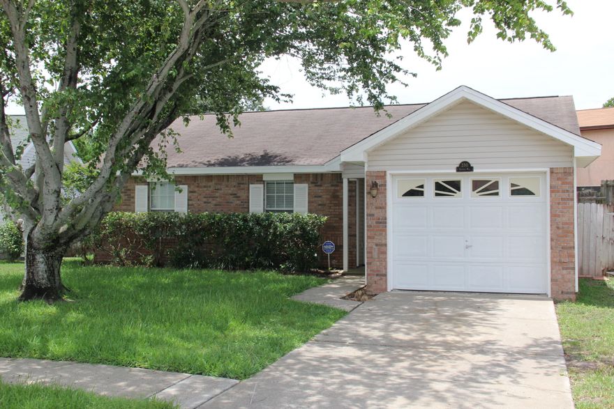 Great home centrally located in the heart of Destin! This would be perfect as a starter home or investment property. This custom designed home has many extras throughout including split bedroom floor-plan, brand new hard wood floors, brand new carpet in the bedrooms, freshly painted, new tile back splash, eat-in kitchen, and formal dining room with french glass doors leading out to the backyard, this house is in beautiful shape and move in ready. It also has architectural details such as cathedral and tray ceilings in addition to a bay window. This great home sits on one of the biggest lots in the neighborhood the yard has 6 foot privacy fence and a sprinkler system. Just minutes to the beach, harbor, dining, shopping and everything else Destin has to offer!