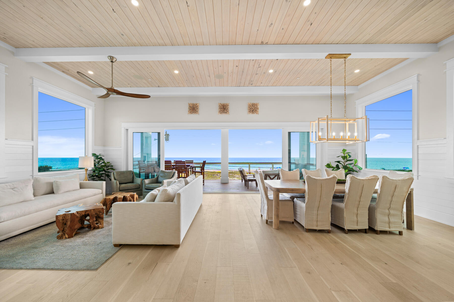 This brand-new fully furnished modern coastal home offers unobstructed, panoramic Gulf views that will never be compromised. Located just steps from the sand, the property features 6,657 square feet of indoor and outdoor living spaces, including 4,497 square feet of heated and cooled interiors, with 8 bedrooms and 7.5 bathrooms. Expansive decks on every floor and multiple indoor and outdoor entertaining areas make the most of the incredible setting.