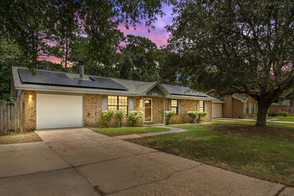 This 3-bedroom, 2-bath home is a perfect opportunity for someone looking to renovate and add value. The layout includes a functional kitchen, a dining area, and a living room with good natural light. All three bedrooms are reasonably sized, and the primary bedroom has its own full bath.Outside, you'll find a spacious, fully fenced backyard with a patio--perfect for outdoor projects, pets, or relaxing once fixed up. The 1-car garage offers additional storage or workspace. Solar panels are installed and will be paid off at closing, helping reduce future energy costs.Located in a convenient area close to NAS Pensacola and just a short drive from the white sand beaches of Perdido Key. This home needs work but has potential for the right buyer. Being sold as-is.