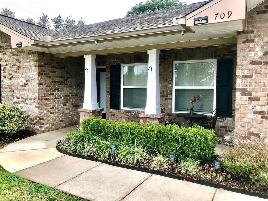 Like New!  Second owner custom built brick contemporary home built by Acree Construction and located in the heart of FWB. Great schools nearby and a short drive to the beach. This home features beautiful hardwood flooring, new shutters and other high end touches throughout. Modern kitchen features thick granite counters and soft-close cherry cabinetry, plus a commercial-sized refrigerator making mealtime a family affair. Medium-sized fenced back yard offers a fire pit area and back porch/deck ready for outdoor living. Plenty of storage as well, with two sheds. This home has been meticulously cared for, and sellers will transfer a home warranty valid for up to two years.