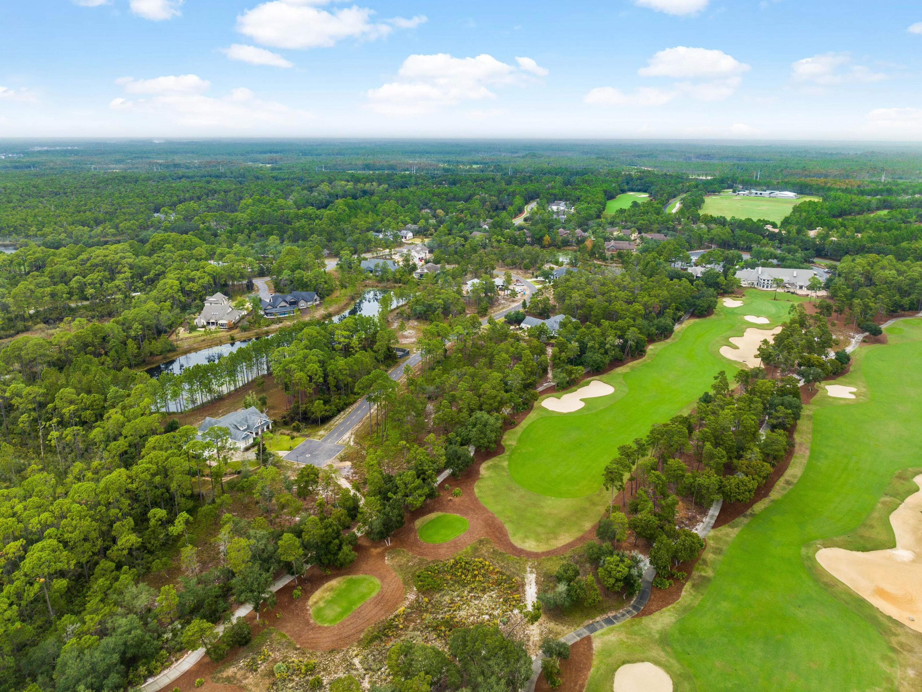 Discover an unparalleled opportunity to build your dream home in the prestigious Wild Heron community. This exceptional golf-front lot, ideally positioned on the 18th tee of the renowned golf course, offers stunning views and an exclusive cul-de-sac location. With a variance already secured, this expansive, flat lot is ready for development, providing a rare and buildable canvas for your vision. Surrounded by the natural beauty and refined amenities of Wild Heron, you'll enjoy access to a top-tier golf course, an inviting clubhouse and all the charm of this sought-after neighborhood. Perfect for those seeking a private, custom-built residence by the gulf, this lot embodies the best of coastal living and luxury.