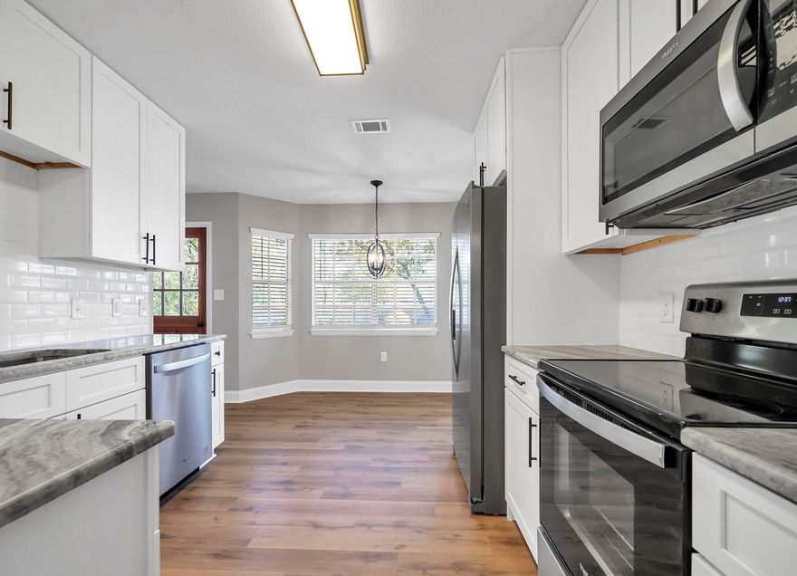 Lovely remodeled home on large .64 acre corner lot.  This home has new kitchen, interior paint, new flooring (laminate wood in living areas and carpeting in bedrooms.  New remodeled bathrooms with new vanities and counter tops,  sinks, lighting, mirrors fixtures, etc.  The kitchen has new cabinets, Stainless Steel Appliances, flooring, sink, fixtures, granite counter tops, lighting, and paint.  The roof is  2021, HVAC 2017 and HWH 2024.  Don't miss visiting this great home looking for a new family