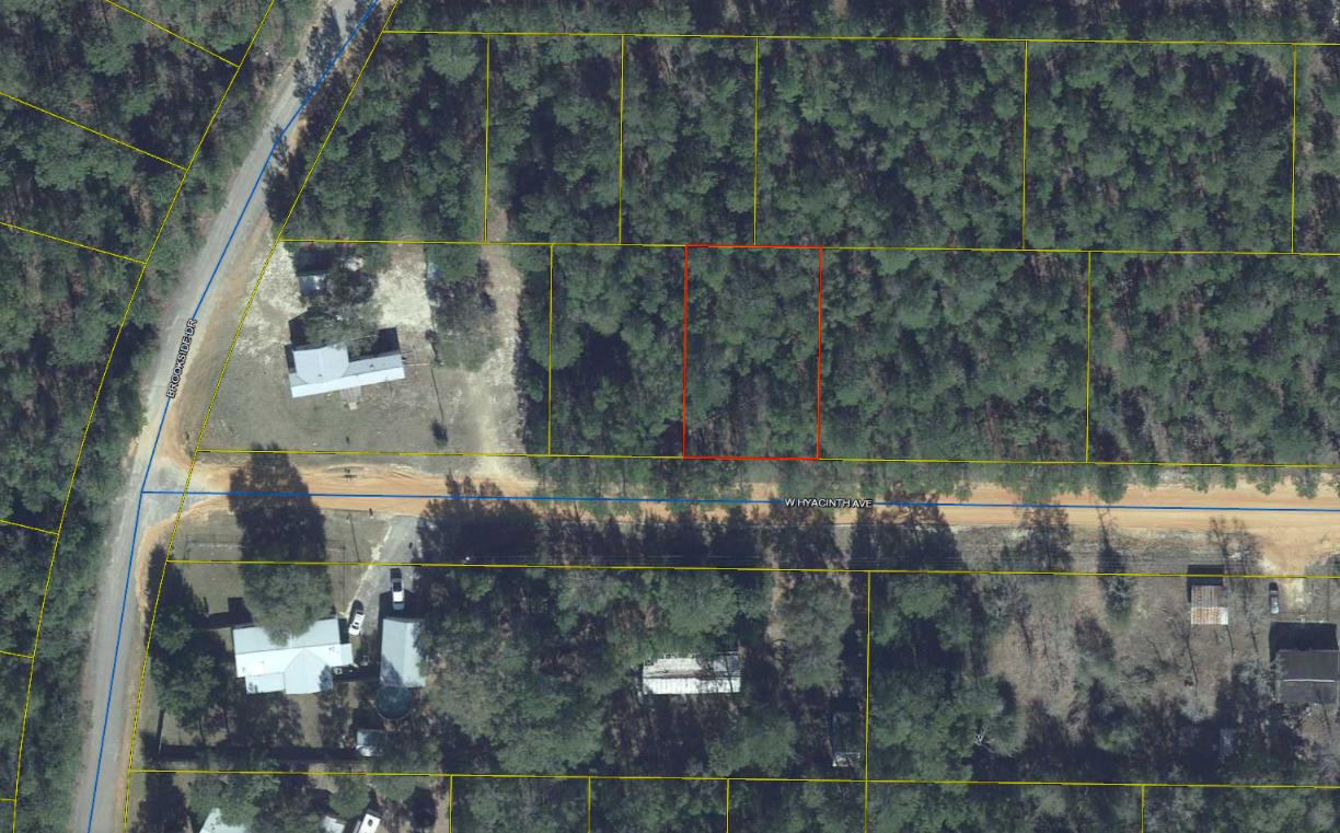 STANDARD LOT IN OAKWOOD HILLS - Hyacinth is currently a dirt road but is easily accessible by a paved road. Don't wait, build your dream home