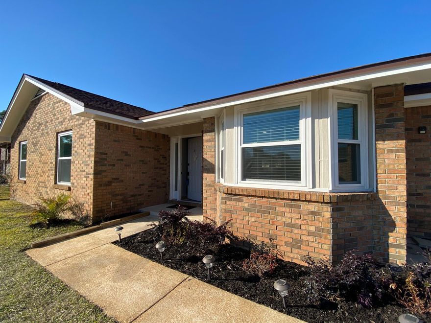 Welcome to 237 Seville Circle! You will not find another house on the market with the attention to detail paid to this complete renovation! $40K in upgrades. Meticulously updated 3 Bed/2 full bath one-level home with garage in a prime position, just 3 miles west of Hurlburt Field AFB. Conveniently located just off Hwy 98, Cimarron Estates is a non-HOA neighborhood community of single residential homes. Recent updates include New Roof, New Windows, New Kitchen, Updated Baths, New Flooring, New Paint, New stainless-Steel Appliances, Water Filtration System, and New Garage Door totaling $40K+. HVAC replaced 2014. Perfect size home plus bonus 224 SF heated and cooled large Florida Room off the Living Area overlooking your large privacy-fenced backyard oasis with extended patio and firepit!