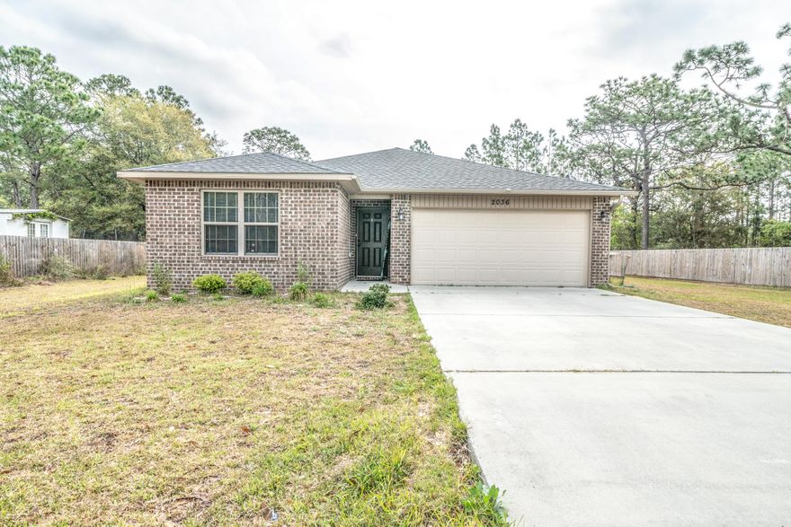 Charming 3 bedroom 2 bathroom home in Navarre built in 2016! Located with easy access to Hwy 98! Just minutes from the beach, 15 Miles to Hurlburt Field, and 26 Miles to Eglin AFB!This home features an immaculate large eat in kitchen with island, pantry, and granite counter tops. The home features recessed lighting, a separate dining room, and well sized living room with sliding glass door to big backyard.The cozy master bedroom and bathroom feature double vanity, two walk in closets, and tiled shower/tub combination.Come check it out today!