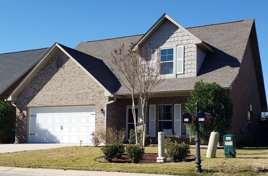 Located just 1 mile East of Navarre Bridge, and  this charming two-story home offers deeded sound access and is move-in ready! The spacious layout features a functional kitchen with an island that overlooks the living area. The main bedroom and bathroom are on the lower level, along with laundry and the half bath. Upstairs you will find 3 more spacious rooms and a full bath. The community features underground utilities and it's perfectly situated near stores, Navarre Beach, and Hurlburt Field AFB. Enjoy the peaceful surroundings with views of wildlife and water activities right from your own neighborhood!
