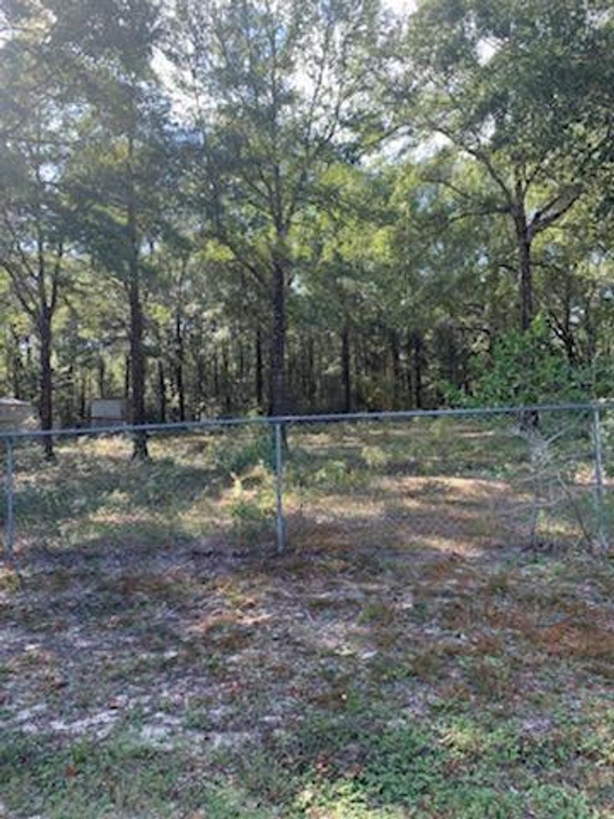 Great lot ready to build your forever home. Beautiful Oak Trees throughout and chain link fence around the outer perimeters of the lot.
Note chain link will need to be run 
straight back to lot.line.
Area at back where fenced runs across adjoing lot does not covey