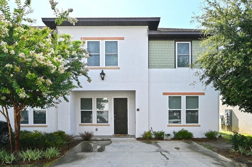 Beautiful End Unit in Gated Community - Spacious 3BR/3BA Home with Luxury Finishes offers 2,256 sq. ft. of open living space and a thoughtfully designed layout featuring a ground-floor master suite.Inside, you'll find solid surface countertops throughout, all-wood cabinetry, luxury vinyl plank flooring, and upgraded carpet for a perfect blend of style and comfort. The kitchen comes fully equipped with stainless steel appliances, while the high-impact (hurricane-rated) doors and windows provide peace of mind and energy efficiency.The master suite features a custom walk-in shower and custom-built closet, with walk-in closets in every bedroom! Enjoy the flexibility of two living areas--one upstairs and one downplus an additional study area perfect for remote work or hobbies.

Outdoor living is just as inviting with a private paver porch and an upstairs screened-in balcony ideal for relaxing or entertaining.

Located in a gated community, residents enjoy access to a neighborhood pool and clubhouse. The HOA covers front landscaping, trash, streetlights, and common area maintenance, making for a truly low-maintenance lifestyle.

=?? Key Features:

2,256 sq. ft. end unit with open floor plan

Ground-floor master suite with custom shower & closet

Solid surface countertops & all-wood cabinetry

Stainless steel appliances

Two A/C units & heat pump water heater

Up & downstairs living areas + study space

Private paver porch & screened-in balcony

Gated community with pool & clubhouse

HOA-maintained front landscaping & common areas

Come experience comfort, convenience, and quality livingthis home really has it all!