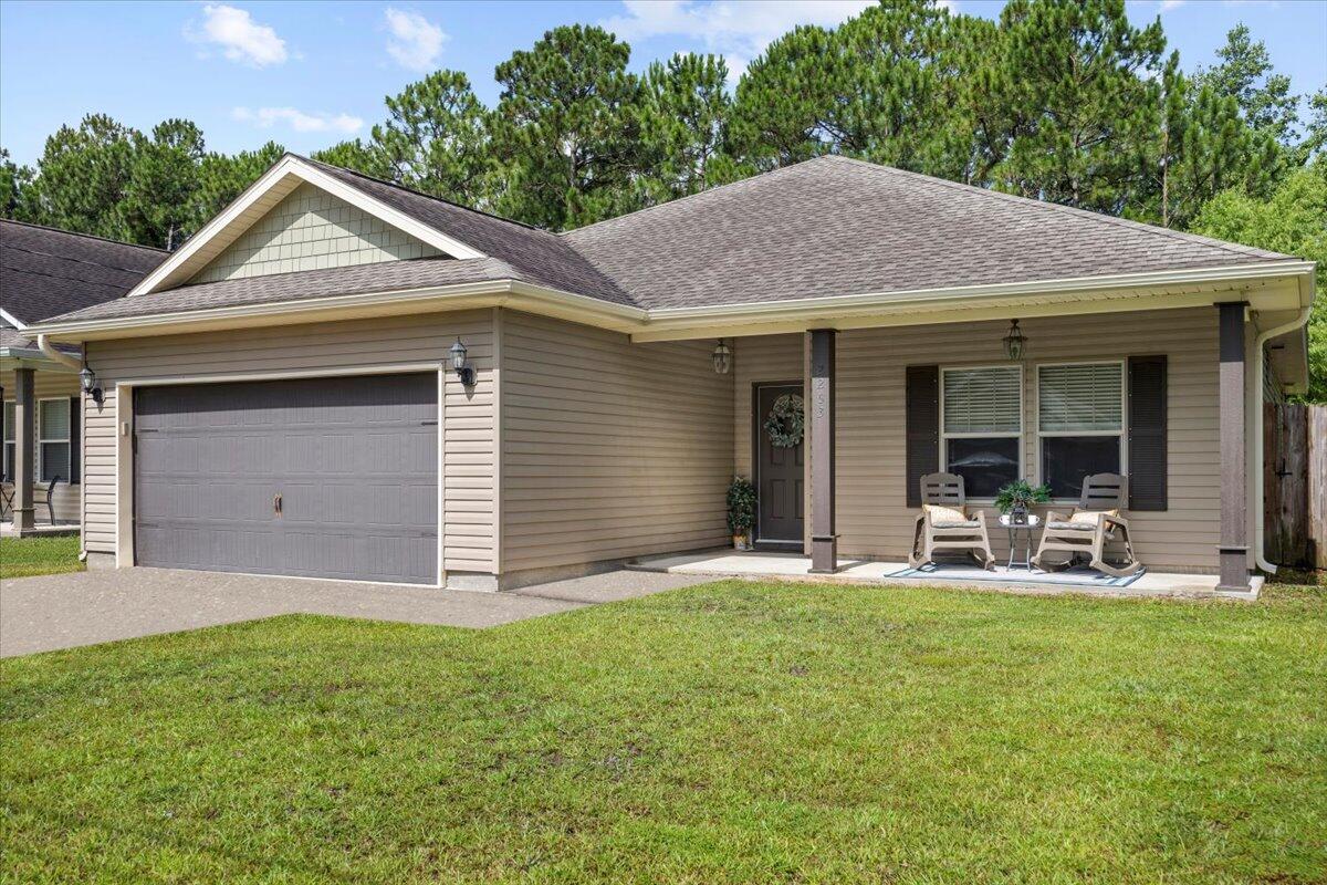 Welcome Home to this thoughtfully designed 3BR/2BA retreat in beautiful Navarre, FL. From the moment you walk in, you'll love the open concept, tray ceilings, and warm engineered hardwood floors underfoot. The kitchen features timeless granite countertops and flows seamlessly into the living space--perfect for gathering. French doors with internal blinds lead to a peaceful patio, ideal for morning coffee. The master suite offers two walk-in closets for effortless organization. With a new HVAC (2022), new water heater, and inviting front and back patios, this home blends comfort and charm in all the right ways.