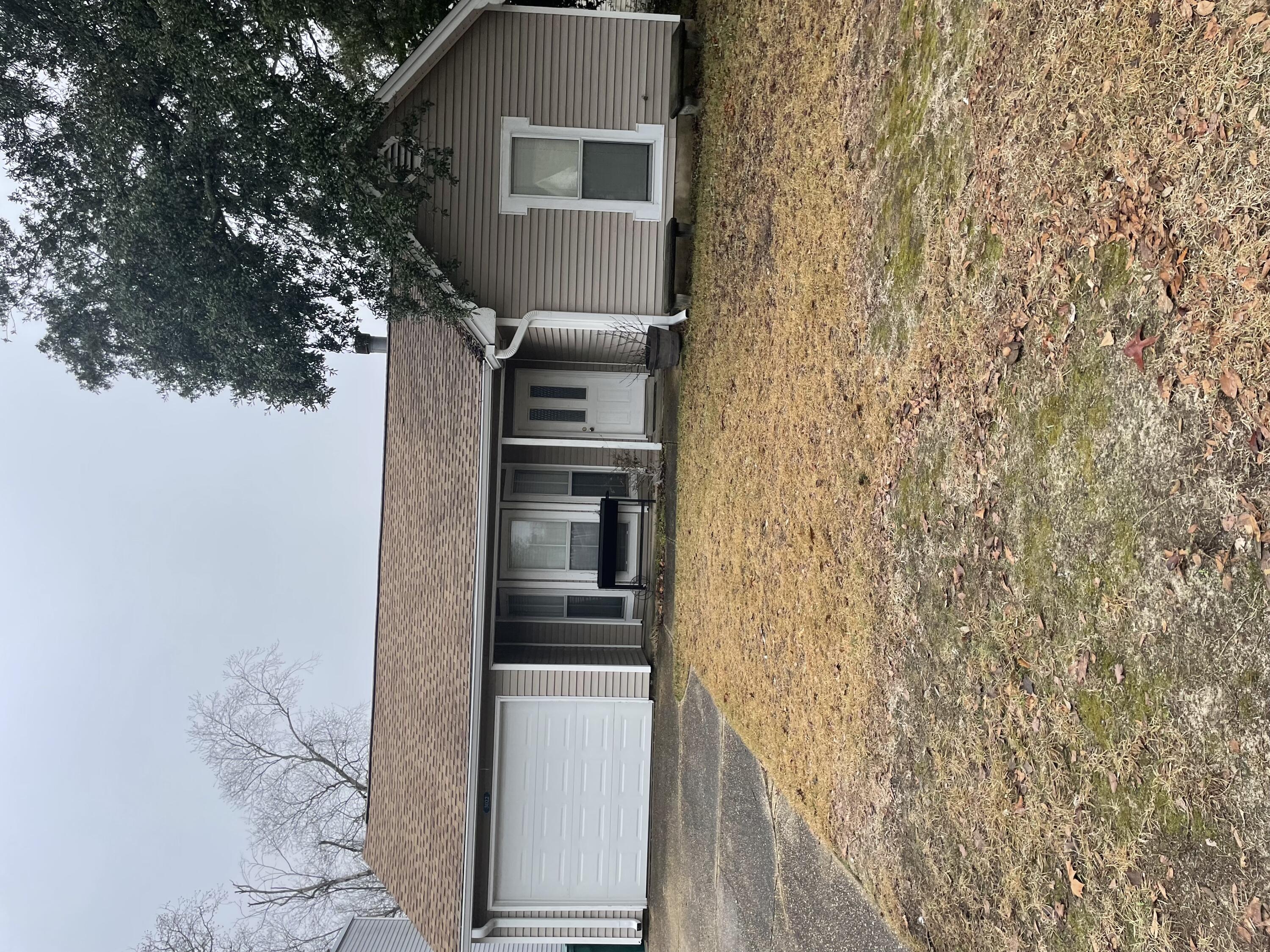 This is a well maintained 3 bedroom 2 bath home with 1 car garage. Living room features stone fireplace, french doors to backyard and wide-planked wood laminate floors. 2 ' faux wood blinds thru out, and blinds enclosed on all french doors. Open floor plan. Kitchen has a nice stove, large fridge with ice maker. Master bath has a walk in custom tile shower. Master bedroom has vaulted ceiling and french door to backyard. Non-warranted washer & dryer included. Privacy fenced yard features big deck for BBQs and entertaining