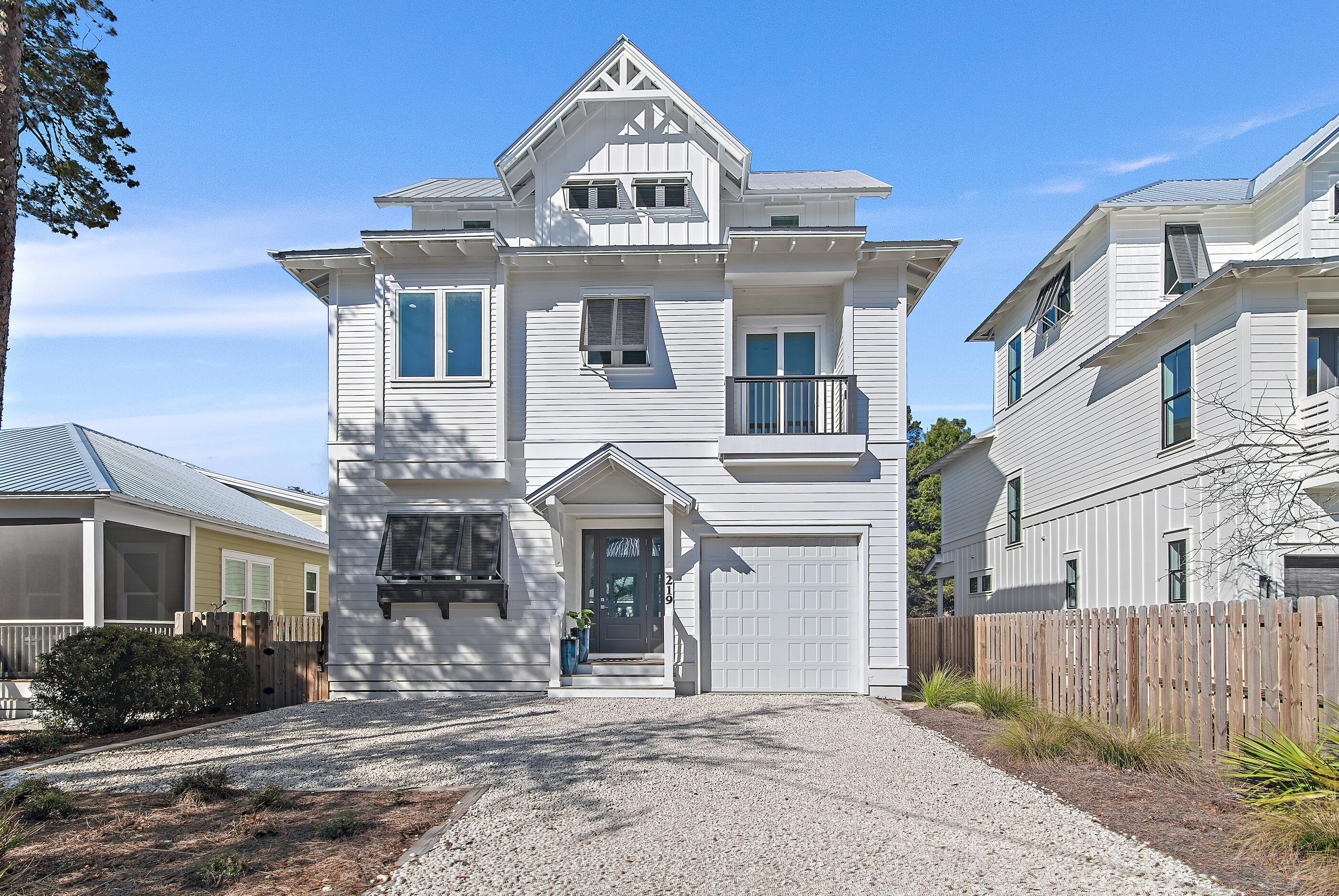 South of 30A and newly constructed, 219 Dalton stands as a timeless masterpiece of elegance and coastal luxury with a modern flair. Upon initial entry, the heart of the home unfolds with a sophisticated living space meticulously designed for both relaxation and entertainment. Soaring ceilings, natural light, and warm wood tones infuse the space with coastal ambiance, while the outdoor oasis beckons for gatherings with a covered porch and private heated saltwater pool. Ideal for culinary enthusiasts, the gourmet kitchen offers stunning quartz countertops coupled with custom tile, a luxury appliance package with gas range and an oversized butler's pantry. Ascending to the 2nd floor, you are greeted with 2 bright & airy junior suites, each paired with beautiful spa-like baths. An additional living quarters or guest bedroom, offers the perfect setup to use as desired. An additional guest suite with private bath and laundry completes this level. Anchored by a wall of windows showcasing stunning views overlooking the tree line, the spacious main suite situated on the third level is synonymous with relaxation with smooth walls, soaring vaulted ceilings, and a dedicated covered terrace. The attached sumptuous ensuite creates a spa-like experience with a freestanding soaking tub, a beautifully tiled walk-in shower with seating, and a separate water closet. Just outside and perfect for those family gatherings year-round, the backyard oasis is bordered by lush vegetation and features a private heated saltwater pool with plenty of space to entertain, lounge and unwind. Location is everything and in just five minutes, you can walk to the Eastern Lake Public Beach Access, which boasts nearly 400 feet of public beach frontage across six pristine acres with additional guest parking available if needed.
Nestled on the south side of Scenic Highway 30A, the sought-after area of Eastern Lake offers residents with close proximity to both beach and lake access, as well as a walking distance to Greenway Park, the "new town center," featuring Wild Olives, Canopy Road Breakfast Cafe, Turbo Coffee, Local Cantina, Pecan Jacks, Jonah Allen Art Gallery, local boutiques, and State Forest access. With impressive annual revenue projections exceeding $125,000 and no HOA, 219 Dalton is a compelling opportunity for investors and second or full-time residents alike. Schedule a private viewing today and start living the coastal lifestyle you deserve.