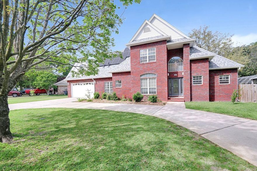 Majestic home located in the amazing waterfront community of Indian Shores, only 5 minutes from the East gate! Being in a cul-de-sac makes it an ideal neighborhood for learning to ride bikes, early morning jogs or evening strolls to the community dock and park. Large 4 car garage(42X22X30X19) has plenty of room for land and water recreation toys, with a front and back opening garage door. Architectural shingle roof with secondary water barrier installed April 2020 and new top of the line solar panels installed April 2020 With 4 bedrooms, 3 full baths, and 2 half baths this home still has more! A oversized bonus or play room, and a separate office or work out room. But there is more, covered lanai, with trex deck, and large gunite pool with screened enclosure. The kitchen has new quartz counter tops installed 2021, storage with cabinet space, dine in nook and separate dining room. Enjoy the large laundry room with shelving, and walk in pantry. Enough space to add a full size second refrigerator or freezer.  Impressive circular drive and 6 foot privacy fenced back yard. Sellers have just installed a cement pad for RV parking, boat parking or just extra parking.  Gas stove, hot water heater, low energy bills with solar panels paid off!!!! Gas outlet on back patio for a true natural gas grill.  Lots of room for pups and kids to play on this large lot.  ELECTRIC BILL FOR LAST MONTH WAS ONLY $22.00