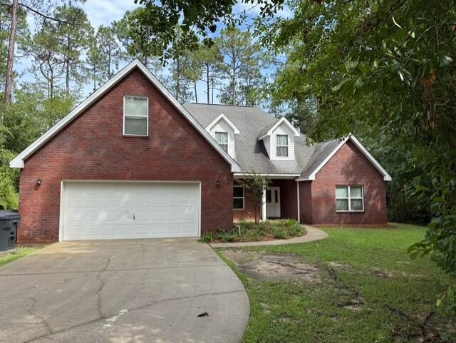 Fantastic home located in Freeport! This beautiful all brick 4 bedroom 2 bath home features a 2 car garage, screen in back porch, large wooded and secluded lot with no HOA, and plenty of parking. This home aslo features a formal dining room, fire place in the living room and primary bedroom along with lots of hard wood floors and tile in the wet area. This split bedroom plan also includes an additional bonus room above the garage for an office, extra bedroom, or studio.