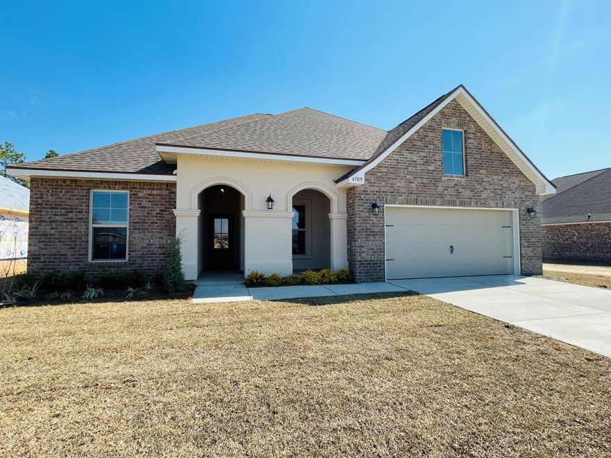 Awesome Builder Rate Incentives!  (Restrictions apply) 

The HICKORY III A in Patriot Ridge community offers a 5 bedroom, 3 full bathroom, open design. Upgrades added (list attached).
Features: double vanity, garden tub, separate shower, and walk-in closet in master suite, double vanity in all other bathrooms, den, formal dining room, kitchen island, walk-in pantry, covered front and rear porches, boot bench at garage entry, recessed lighting, crown molding, ceiling fans in living room and master bedroom, smoke and carbon monoxide detectors, landscaping, architectural 30-year shingles, flood lights, and more!
Energy Efficient Features:  electric water heater, a kitchen appliance package with a electric range, vinyl low E MI windows, and more!